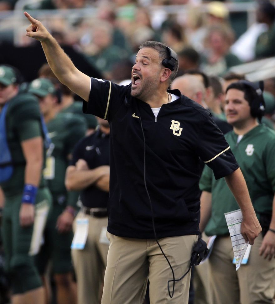 FILE - In this Sept. 2, 2017, file photo, Baylor head coach Matt Rhule calls in a play against Liberty in the first half of an NCAA college football game, in Waco, Texas. Rhule had some setbacks at Temple before a couple of 10-win seasons. The Bears, who lost his debut, are home again Saturday night against a UTSA that didn't play last week because of Hurricane Harvey. (Jerry Larson/Waco Tribune Herald, via AP, File)