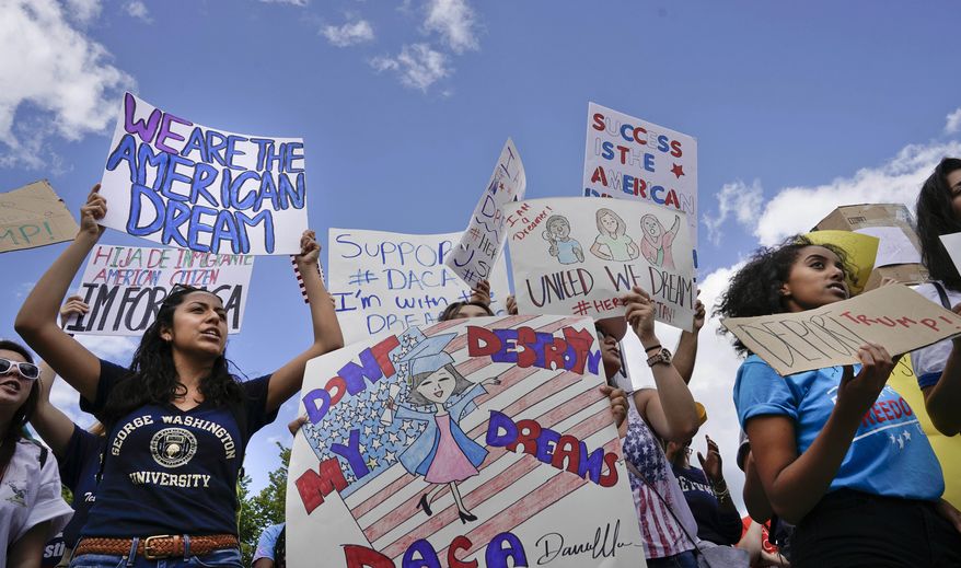 Supporters of Deferred Action for Childhood Arrival program (DACA) demonstrate on Pennsylvania Avenue in front of the White House in Washington, Saturday, Sept. 9, 2017. President Donald Trump ordered and end of protections for young immigrants who were brought into the country illegally as children, but gave Congress six months to act on it. (AP Photo/Pablo Martinez Monsivais)