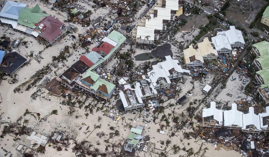This Sept. 6, 2017 photo provided by the Dutch Defense Ministry shows storm damage in the aftermath of Hurricane Irma, in St. Maarten. Irma cut a path of devastation across the northern Caribbean, leaving thousands homeless after destroying buildings and uprooting trees. Significant damage was reported on the island that is split between French and Dutch control. (Gerben Van Es/Dutch Defense Ministry via AP)