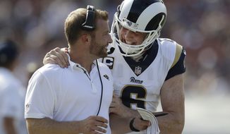Los Angeles Rams head coach Sean McVay, left, talks with quarterback Jared Goff during the second half of an NFL football game against the Indianapolis Colts, Sunday, Sept. 10, 2017, in Los Angeles. (AP Photo/Jae C. Hong)