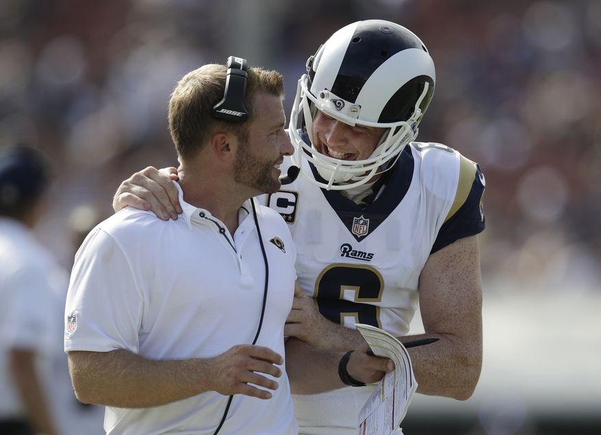 Los Angeles Rams head coach Sean McVay, left, talks with quarterback Jared Goff during the second half of an NFL football game against the Indianapolis Colts, Sunday, Sept. 10, 2017, in Los Angeles. (AP Photo/Jae C. Hong)