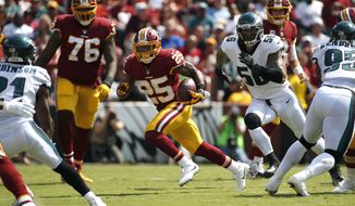 Washington Redskins running back Chris Thompson (25) rushes the ball in the first half of an NFL football game against the Philadelphia Eagles, Sunday, Sept. 10, 2017, in Landover, Md. (AP Photo/Alex Brandon)
