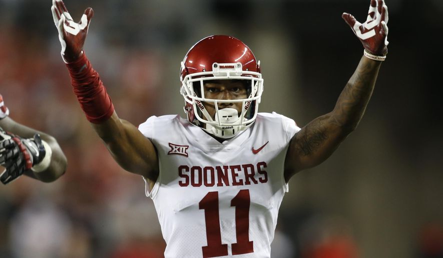 Oklahoma cornerback Parnell Motley celebrates his interception against Ohio State during the second half of an NCAA college football game Saturday, Sept. 9, 2017, in Columbus, Ohio. Oklahoma defeated Ohio State 31-16. (AP Photo/Paul Vernon)