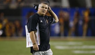Arizona State coach Todd Graham stands on the field during the first half of the team&#39;s NCAA college football game against San Diego State on Saturday, Sept. 9, 2017, in Tempe, Ariz. (AP Photo/Ross D. Franklin)