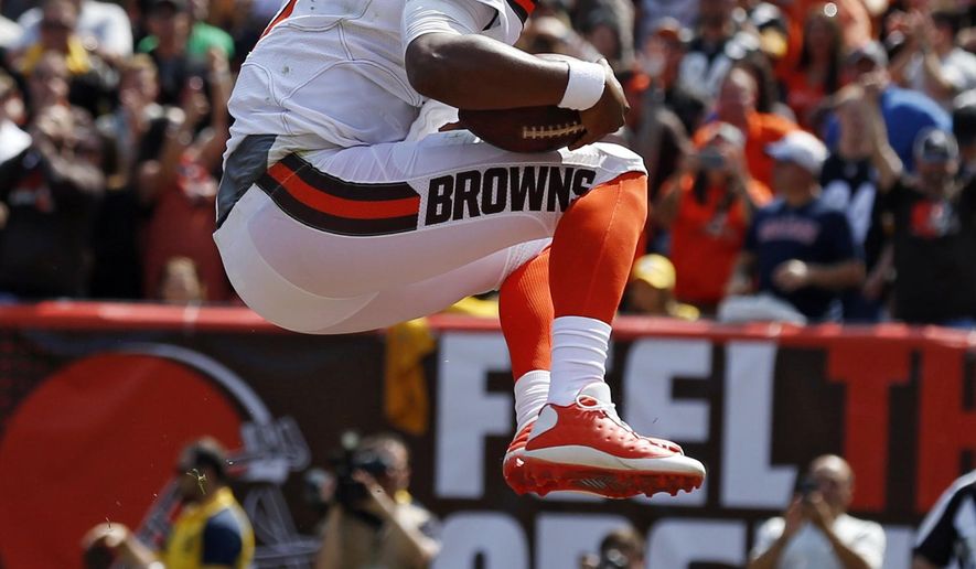 Cleveland Browns quarterback DeShone Kizer celebrates after a 1-yard touchdown during the first half of an NFL football game against the Pittsburgh Steelers, Sunday, Sept. 10, 2017, in Cleveland. (AP Photo/Ron Schwane)