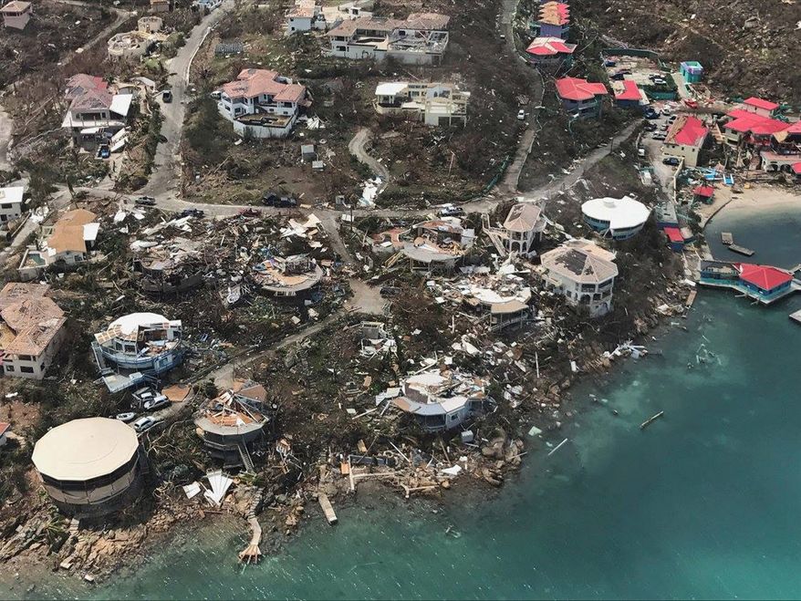 Hurricane Irma increased its death toll as it plowed its way through Florida after causing widespread destruction in the Caribbean, including here on the U.S. Virgin Islands. (Associated Press)