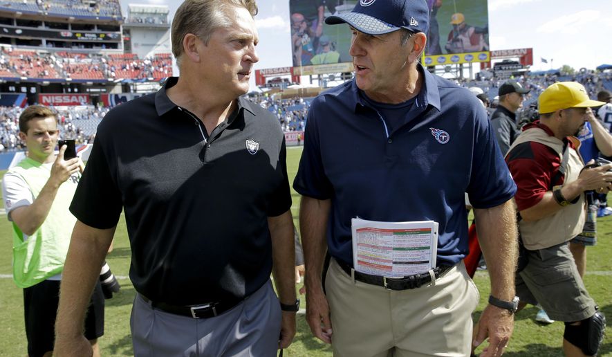 Oakland Raiders head coach Jack Del Rio, left, and Tennessee Titans head coach Mike Mularkey talk after an NFL football game Sunday, Sept. 10, 2017, in Nashville, Tenn. The Raiders won 26-16.(AP Photo/James Kenney)