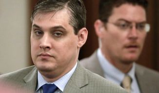 Zachary Adams, left, enters the courtroom after a break in his trial for the kidnapping, rape and murder of nursing student Holly Bobo on Sept. 11, 2017, in Savannah, Tenn. Bobo, 20, disappeared from her home in Parsons, Tenn. on April 13, 2011, and her remains were found in September 2014. (AP Photo/Mark Humphrey, Pool)