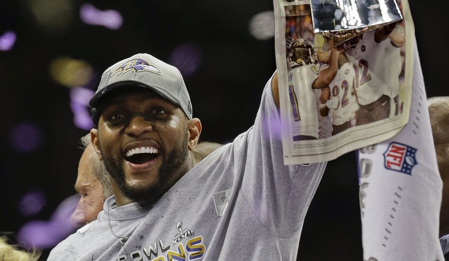 FILE - In this Sunday, Feb. 3, 2013 file photo, Baltimore Ravens linebacker Ray Lewis (52) holds up the Vince Lombardi Trophy after defeating the San Francisco 49ers 34-31 in the NFL Super Bowl XLVII football game in New Orleans. Star linebackers Ray Lewis and Brian Urlacher and game-breaking wide receiver Randy Moss are among 11 first-year eligible players for the Pro Football Hall of Fame. (AP Photo/Julio Cortez, File) **FILE**