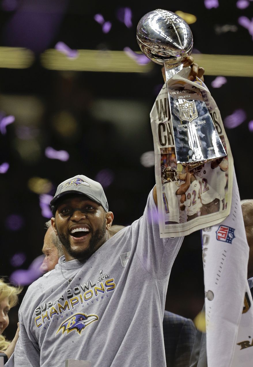 FILE - In this Sunday, Feb. 3, 2013 file photo, Baltimore Ravens linebacker Ray Lewis (52) holds up the Vince Lombardi Trophy after defeating the San Francisco 49ers 34-31 in the NFL Super Bowl XLVII football game in New Orleans. Star linebackers Ray Lewis and Brian Urlacher and game-breaking wide receiver Randy Moss are among 11 first-year eligible players for the Pro Football Hall of Fame. (AP Photo/Julio Cortez, File) **FILE**