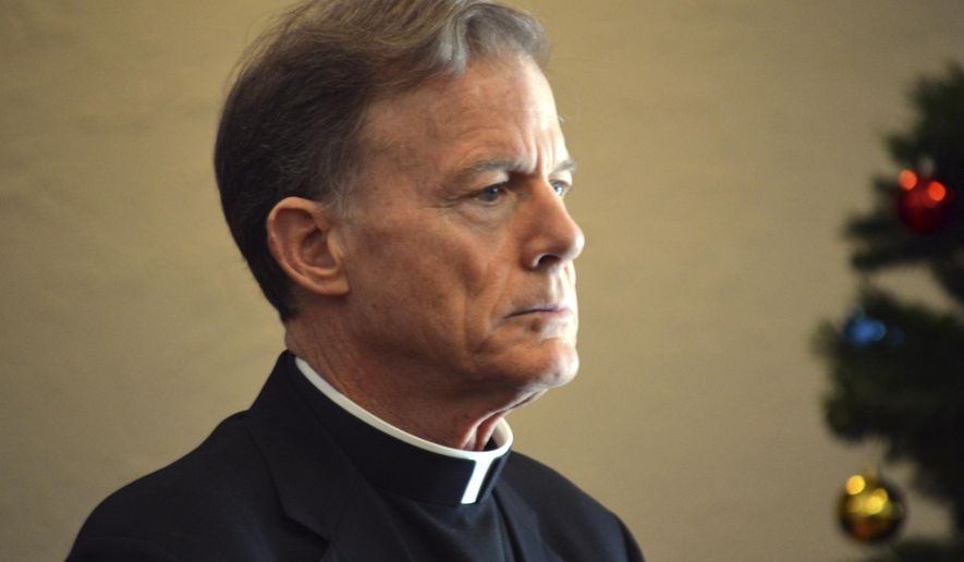 FILE--In this Dec. 20, 2016, file photo, Santa Fe Archbishop John C. Wester speaks at the Archdiocese of Santa Fe in Albuquerque, N.M. Wester announced Tuesday, Sept. 12, 2017, he was releasing the names of priests and religious leaders who have been found guilty of sexually abusing children after decades of pressure from victims and their family members. (AP Photo/Russell Contreras, file)