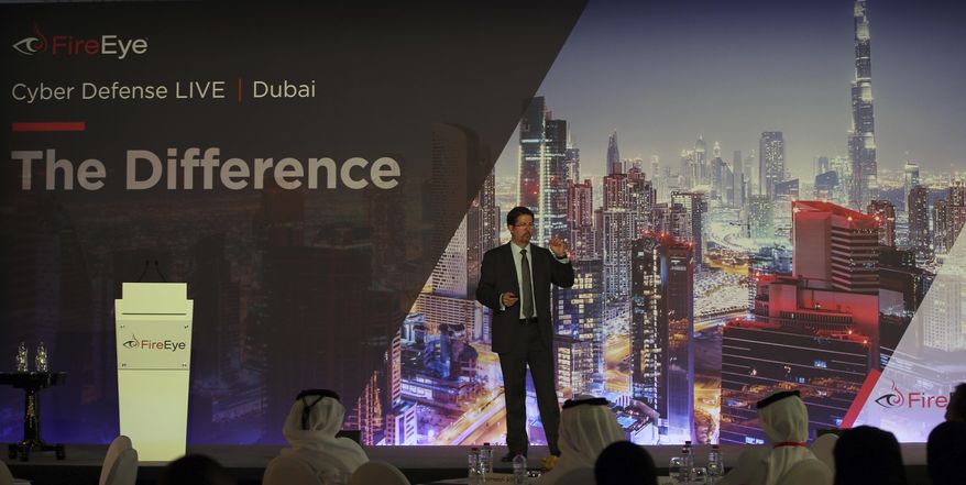 Tony Cole, Vice President of FireEye Inc., a cybersecurity firm headquartered in Milpitas, California, speaks at the FireEye Cyber Defence Live conference, Tuesday, Sept. 12, 2017, in Dubai, United Arab Emirates. State-sponsored hacks have become an increasing worry among countries across the Persian Gulf. They include suspected Iranian cyberattacks on Saudi Arabia to leaked emails causing consternation among nominally allied Arab nations. (AP Photo/Kamran Jebreili)