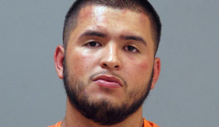 This Sunday, Sept. 10, 2017, photo provided by the Blue Earth County Jail in Mankato, Minn., shows Juan Carlos Lamas Jr., of Shakopee, Minn. A criminal complaint filed Tuesday charges Lamas with multiple counts, including assault, criminal vehicular operation and drunken driving. Police say he deliberately drove into a group of people in Minnesota early Sunday, injuring six. (Blue Earth County Jail via AP)