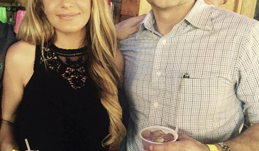 This August 2017 photo provided by Paul Hargrave shows Hargrave with girlfriend Crystal McDowell. McDowell, a 37-year-old Realtor and mother of two, went missing Aug. 25, the day Hurricane Harvey made landfall in Texas. Her ex-husband, Steven McDowell, was charged with her murder on Saturday, Sept. 9. (Paul Hargrave via AP)