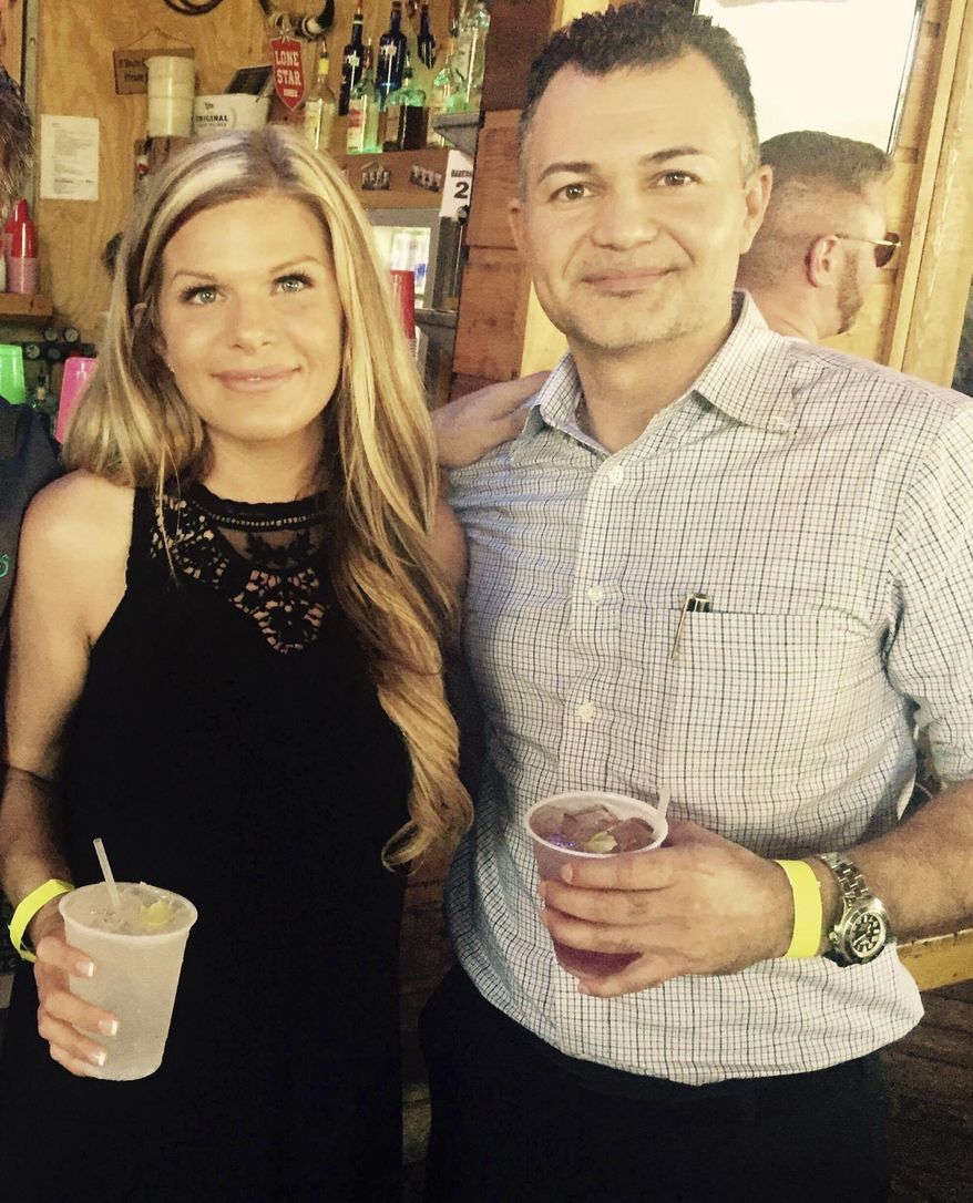 This August 2017 photo provided by Paul Hargrave shows Hargrave with girlfriend Crystal McDowell. McDowell, a 37-year-old Realtor and mother of two, went missing Aug. 25, the day Hurricane Harvey made landfall in Texas. Her ex-husband, Steven McDowell, was charged with her murder on Saturday, Sept. 9. (Paul Hargrave via AP)