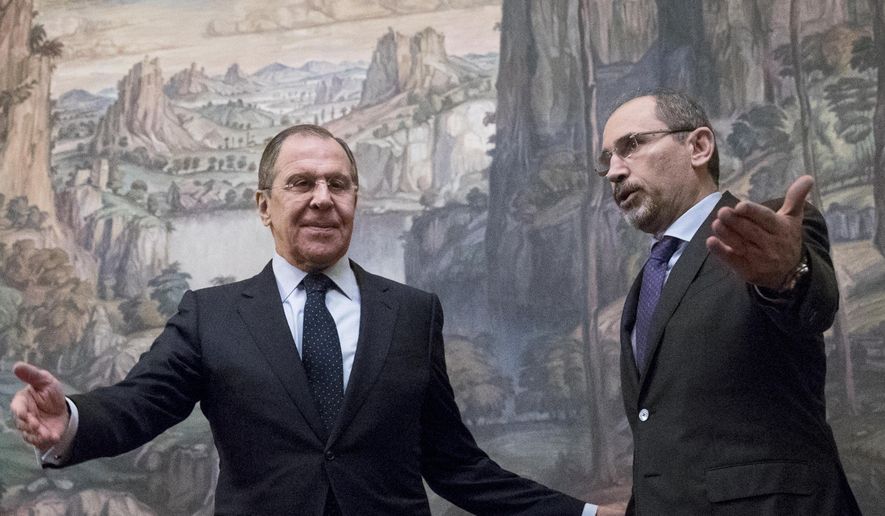 In this Jan. 24, 2017, file photo, Russian Foreign Minister Sergey Lavrov, left, welcomes Jordanian Foreign Minister Ayman Al Safadi during their meeting in Moscow, Russia. Lavrov said Monday, Sept. 11, 2017 that Saudi Arabia assured him it backs a Moscow-led process of negotiating gradual local cease-fires in Syria, including the establishment of &amp;quot;de-escalation zones.&amp;quot; Lavrov spoke after a meeting Monday with his Jordanian counterpart and a day after talks with Saudi leaders. (AP Photo/Pavel Golovkin, File)