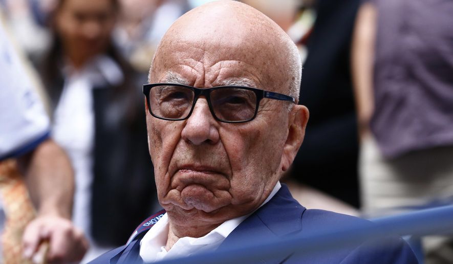 In this Sunday, Sept. 10, 2017, file photo, Rupert Murdoch waits for the start of the men&#x27;s singles final of the U.S. Open tennis tournament between Rafael Nadal, of Spain, and Kevin Anderson, of South Africa, in New York. (AP Photo/Julio Cortez, File)