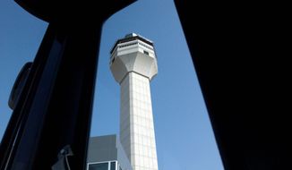 A new air traffic control tower is built at Dulles International Airport, Va, as part of the extension project Thursday, September 22, 2005. ( Photographs by Astrid Riecken / The Washington Times )