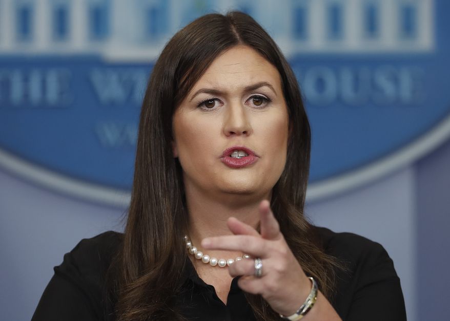 White House press secretary Sarah Huckabee Sanders speaks during a news briefing at the White House, in Washington, Wednesday, Sept. 13, 2017. Huckabee Sanders discussed tax reform, President Donald Trump's planned dinner tonight with House and Senate minority leaders, and other topics. (AP Photo/Carolyn Kaster)