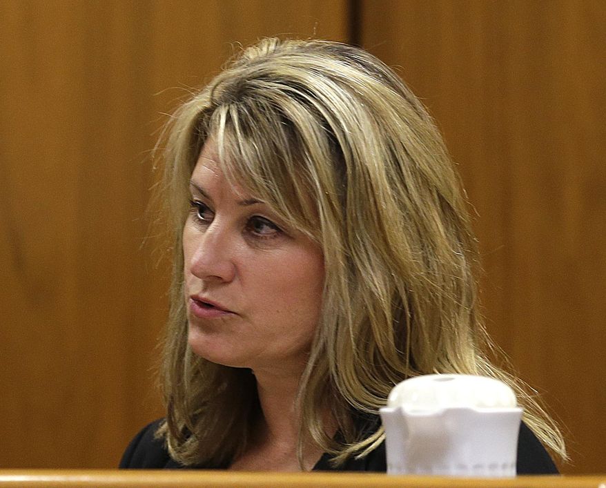 Shelly Fisher, a detective with the Waukesha Police Department, describes her hospital interview with Payton Leutner, the victim in the Slender Man stabbing case. Fisher testified Wednesday, Sept. 13, 2017 in the trial of Anissa Weier in Waukesha, Wis. (Rick Wood/Milwaukee Journal Sentinel via AP, Pool)