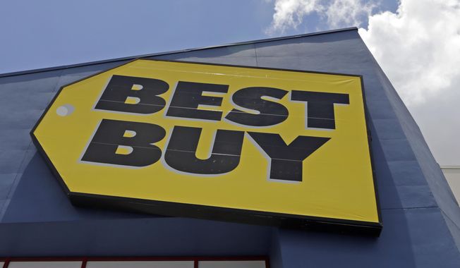 FILE - This Monday, May 22, 2017, file photo shows a Best Buy sign at a store in Hialeah, Fla. Best Buy said it will no longer sell software made by the Russian company Kaspersky Labs. (AP Photo/Alan Diaz, File)