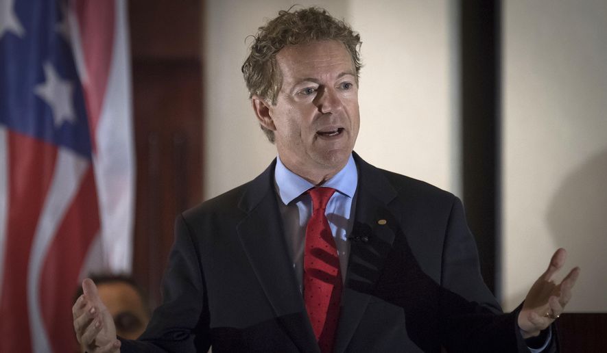 In this Aug. 11, 2017, file photo, Sen. Rand Paul, R-Ky., speaks to supporters in Hebron, Ky. (AP Photo/Bryan Woolston) ** FILE **