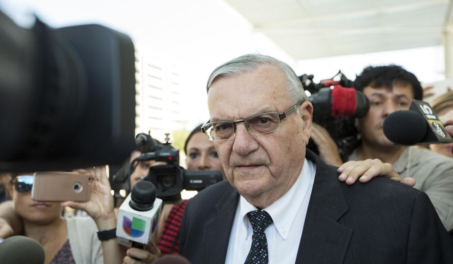 In this July 6, 2017, file photo, former Sheriff Joe Arpaio leaves the federal courthouse in Phoenix, Ariz. (AP Photo/Angie Wang, File)