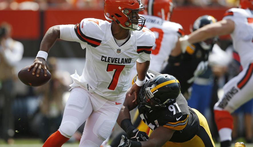 FILE - In this Sept. 10, 2017, file photo, Cleveland Browns quarterback DeShone Kizer (7) avoids Pittsburgh Steelers defensive end Stephon Tuitt (91) during the first half of an NFL football game in Cleveland. Kizer on Sunday, Sept. 17, will face the Baltimore Ravens, whose renowned defense opened the season by forcing five turnovers in a 20-0 rout of Cincinnati. (AP Photo/Ron Schwane, File)
