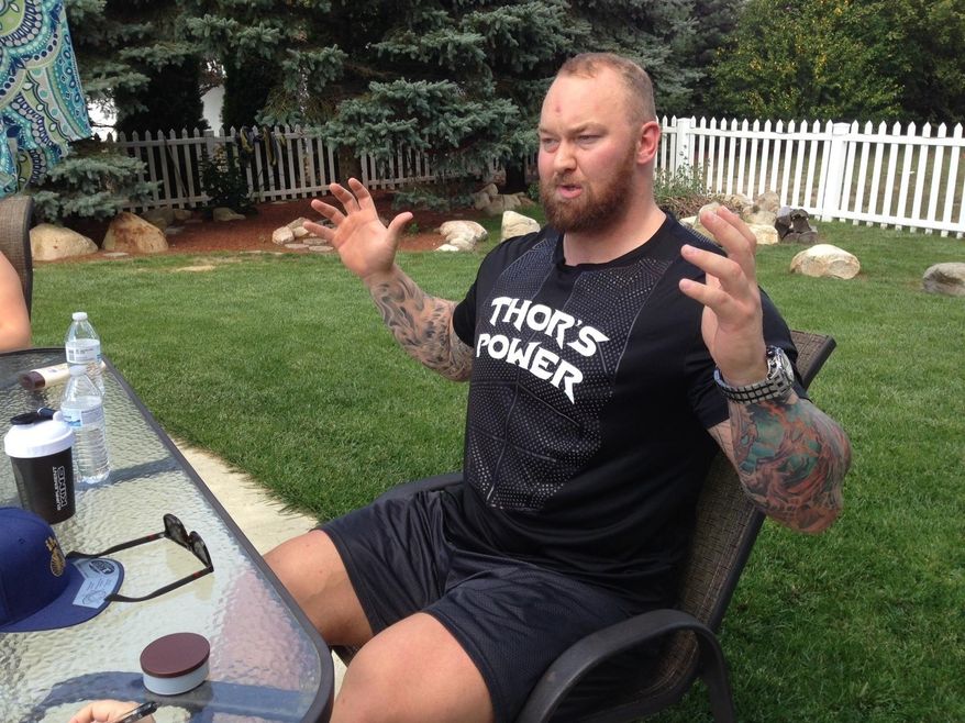 Hafthor Bjornsson, who portrays Gregor "The Mountain" Clegane, in the HBO series, "Game of Thrones," gestures during an interview in Concord, N.H., Thursday, Sept. 14, 2017. Bjornsson is taking part in the annual New Hampshire Highland Games and Festival this weekend in Lincoln, N.H. (AP Photo/Kathy McCormack)