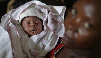 Destitute Ugandan women say they have been abandoned with babies fathered by the tens of thousands of Chinese workers building up the country. (Associated Press/File)