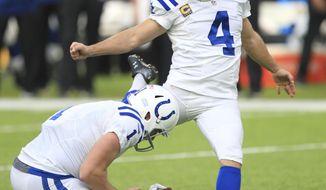 FILE - In this Dec. 18, 2016 file photo, Indianapolis Colts place kicker Adam Vinatieri (4) kicks a 48-yard field goal as Pat McAfee holds during the first half of an NFL football game against the Minnesota Vikings in Minneapolis. Vinatieri faces off against Phil Dawson when the Colts play the Arizona Cardinals on Sunday, Sept. 17. (AP Photo/Andy Clayton-King, File)