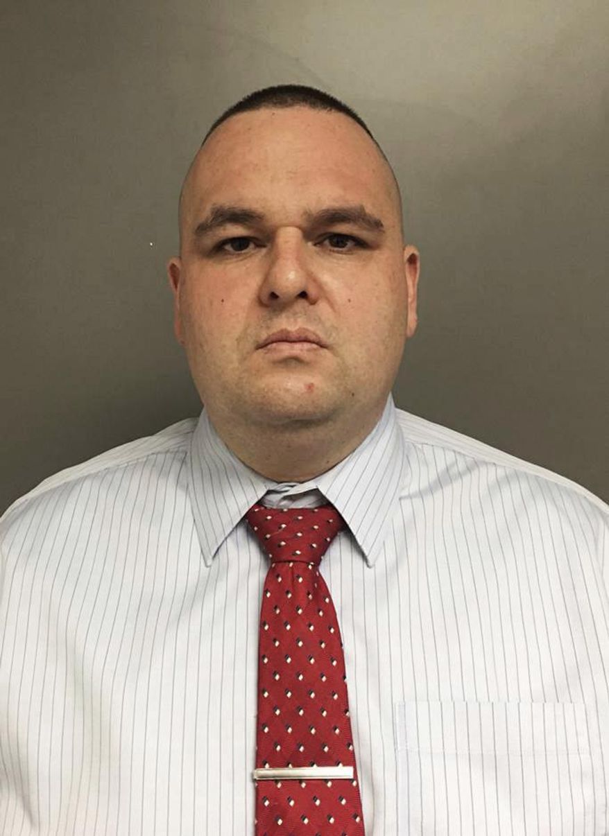 FILE- This March 17, 2017, file, photo provided by the Montgomery County District Attorney's Office in Norristown, Pa., shows former Pennsylvania State Police trooper Joseph Miller. Miller, a former Pennsylvania state trooper who caused the deaths of his pregnant wife and their newborn daughter in what he characterized as a gun-cleaning accident at their home, has pleaded guilty to criminal charges. Miller pleaded guilty to two counts of involuntary manslaughter for causing the March 2014 deaths of JoAnna Miller and the baby she was carrying. The baby girl was delivered but died soon after. (Montgomery County District Attorney's Office via AP, File)