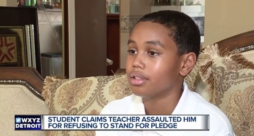 A teacher at East Middle School in Farmington Hills, Michigan, is on administrative leave after she was accused of "violently" snatching 6th-grader Stone Chaney (pictured here) out of his seat because he refused to stand for the Pledge of Allegiance. (WXYZ)