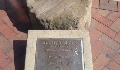 A historic auction block located in Fredericksburg, Va., which was used to sell slaves. City residents will weigh in online and at a public hearing about the fate of the controversial marker. (City of Fredericksburg website)