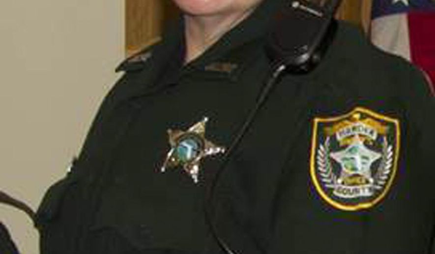 This undated photo provided by the Hardee County Sheriff's Office in Florida shows Hardee County sheriff's deputy Julie Bridges, who was killed in a head-on crash on Sunday, Sept. 10, 2017. Joseph Ossman, a sergeant with the Hardee Correctional Institute, was headed to work Sunday morning, and Bridges was going home after the night shift when their vehicles collided head-on, according to a Florida Highway Patrol release. (Gerald Shackelford/Hardee County Sheriff's Office via AP)