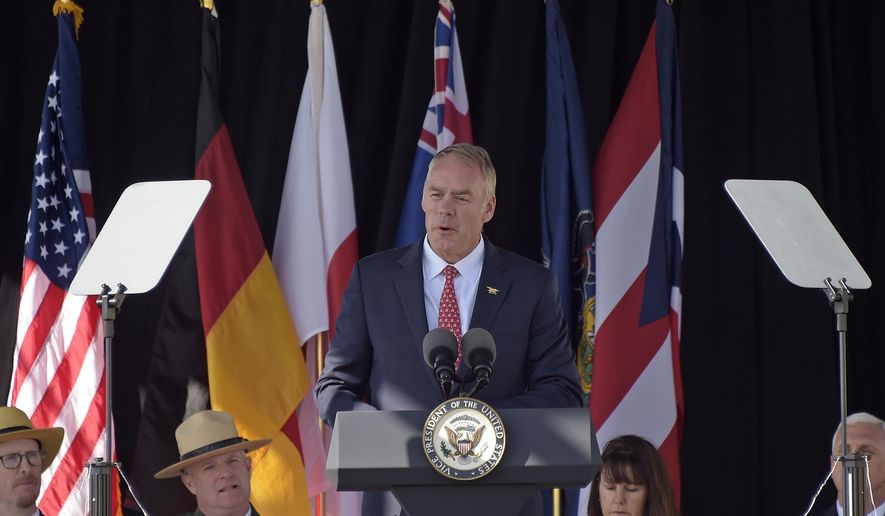Interior Secretary Ryan Zinke speaks during the service of remembrance tribute to the passengers and crew of United Flight 93 at the Flight 93 National Memorial in Shanksville, Pa., Monday, Sept. 11, 2017. (AP Photo/Fred Vuich)