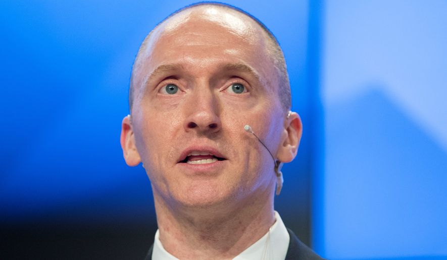 Carter Page says false charges in a Democrat-financed dossier brought him &quot;irreparable damage&quot; and subjected him to death threats. (Associated Press)