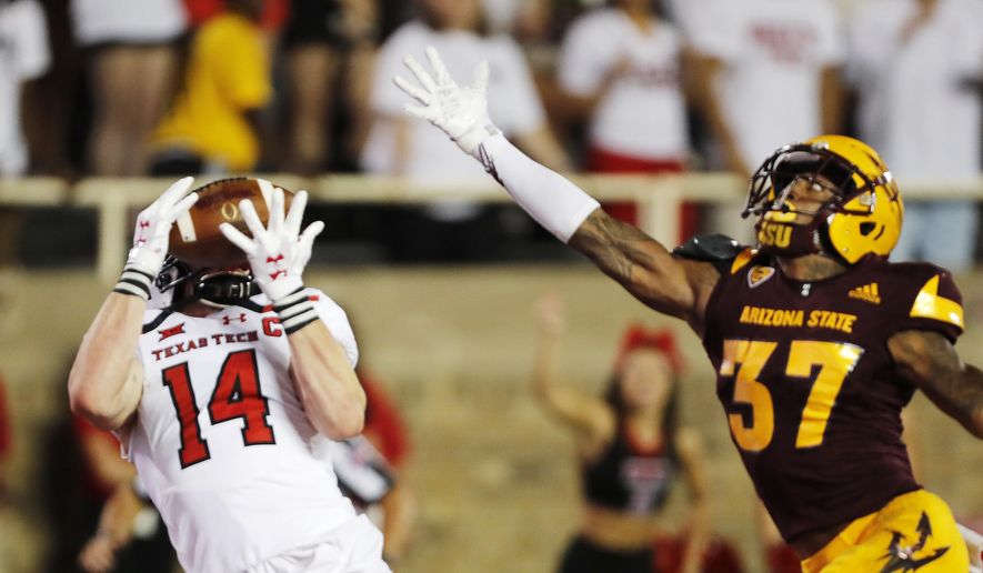 Texas Tech receiver Dylan Cantrell makes a touchdown reception while defended by Arizona State's Joseph Bryant during the first half of an NCAA college football game Saturday, Sept. 16, 2017, in Lubbock, Texas. (Mark Rogers/Lubbock Avalanche-Journal via AP)
