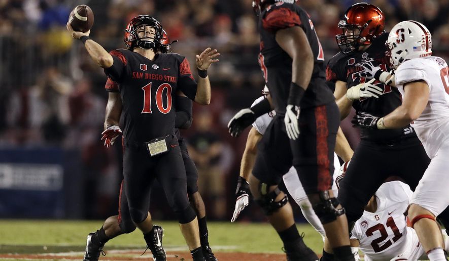 San Diego State quarterback Christian Chapman throws a pass during the first half of an NCAA college football game against Stanford Saturday, Sept. 16, 2017, in San Diego. (AP Photo/Gregory Bull)