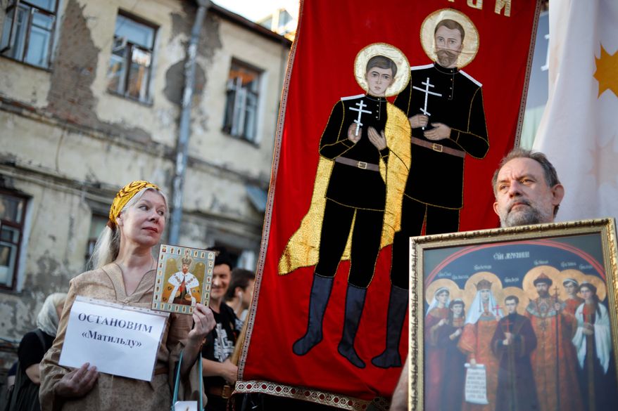 An Orthodox protester holds up a sign reading "Stop Matilda" during a protest against the release of the movie. (Associated Press/File)