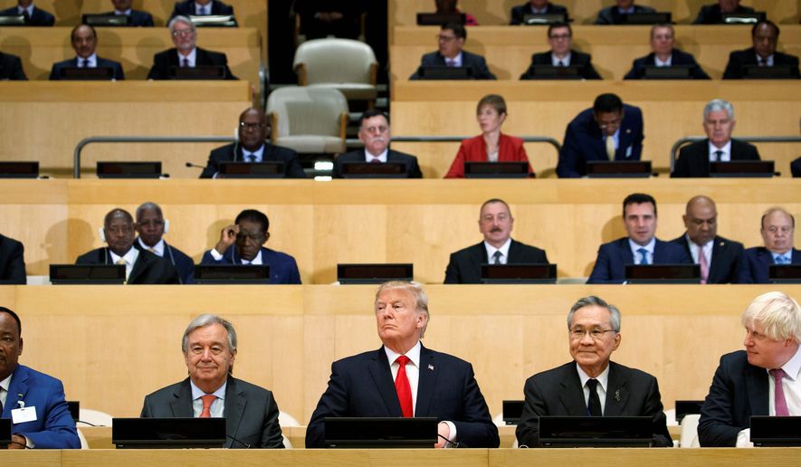 President Trump participated in a photo before the beginning of the &quot;Reforming the United Nations: Management, Security, and Development&quot; meeting during the United Nations General Assembly in New York on Monday. (Associated Press)