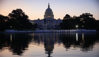 The Capitol is seen at sunrise as Congress returns from the August recess to face work on immigration, the debt limit, funding the government, and help for victims of Hurricane Harvey, in Washington, Tuesday, Sept. 5, 2017. (AP Photo/J. Scott Applewhite)