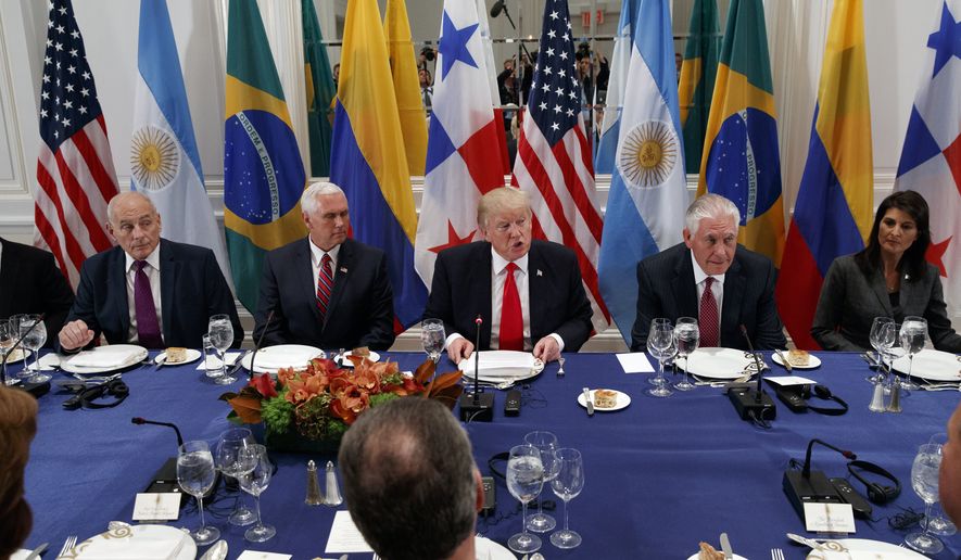 President Donald Trump speaks during a dinner with Latin American leaders at the Palace Hotel during the United Nations General Assembly, Monday, Sept. 18, 2017, in New York, with from left, White House chief of staff John Kelly, Vice President Mike Pence, Trump, Secretary of State Rex Tillerson, and United States Ambassador to the United Nations Nikki Haley. (AP Photo/Evan Vucci)