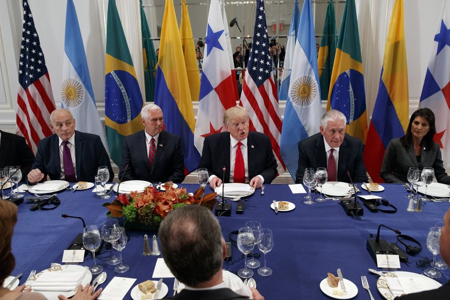President Donald Trump speaks during a dinner with Latin American leaders at the Palace Hotel during the United Nations General Assembly, Monday, Sept. 18, 2017, in New York, with from left, White House chief of staff John Kelly, Vice President Mike Pence, Trump, Secretary of State Rex Tillerson, and United States Ambassador to the United Nations Nikki Haley. (AP Photo/Evan Vucci)