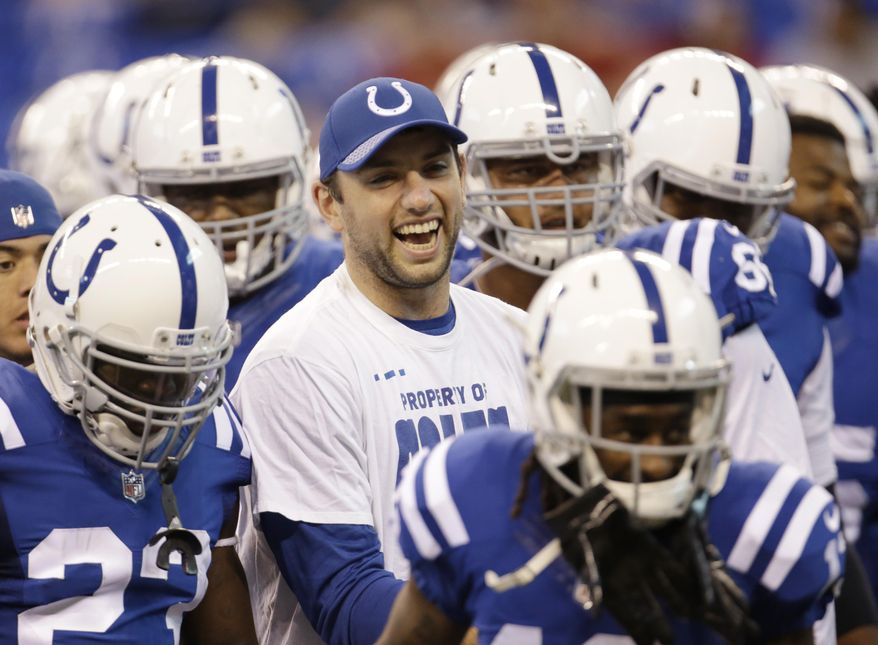 Indianapolis Colts quarterback Andrew Luck smiles as he runs off the field with his teammates before an NFL football game against the Arizona Cardinals, Sunday, Sept. 17, 2017, in Indianapolis. (AP Photo/AJ Mast)