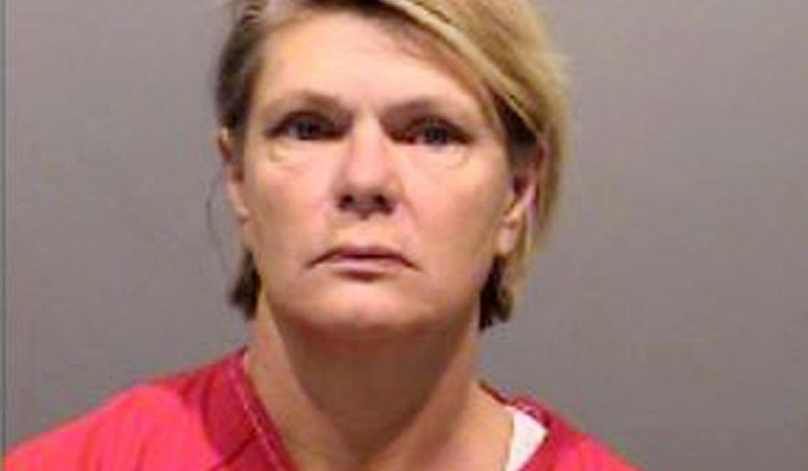 This undated photo provided by Colorado First Judicial District Attorney shows Richelle Schultz. Schultz, a former caseworker in Jefferson County, faces 12 counts of attempting to influence a public servant and 10 counts of forgery. Prosecutors say Schultz falsely entered details of interviews with alleged victims of child abuse and family members but didn't actually do the interviews. (Colorado First Judicial District Attorney via AP)