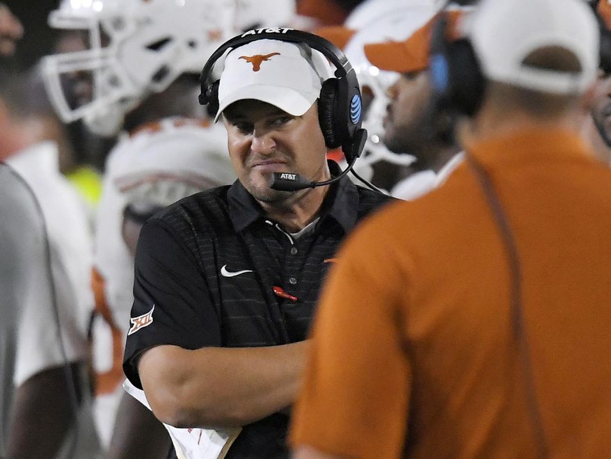 Texas coach Tom Herman stands on the sideline during the second half of the team's NCAA college football game against Southern California, Saturday, Sept. 16, 2017, in Los Angeles. USC won 27-24 in overtime. (AP Photo/Mark J. Terrill)