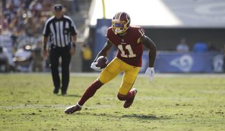 Washington Redskins&#39; Terrelle Pryor carries the ball during an NFL football game against the Los Angeles Rams Sunday, Sept. 17, 2017, in Los Angeles. (AP Photo/Jae C. Hong) ** FILE **