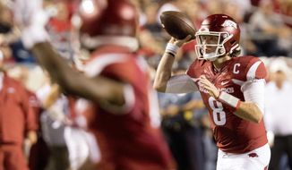 FILE - In this Aug. 31, 2017, file photo, Arkansas quarterback Austin Allen (8) throws the ball downfield during the first quarter of an NCAA college football game against Florida A&amp;amp;M, in Little Rock, Ark. Austin Allen emerged as one of the top quarterbacks in the Southeastern Conference last season in his first year as the starter for Arkansas. This year, the Razorbacks senior has struggled through two games _ but he plans to stop trying to be perfect and have fun this week against Texas A&amp;amp;M. (AP Photo/Gareth Patterson, File)
