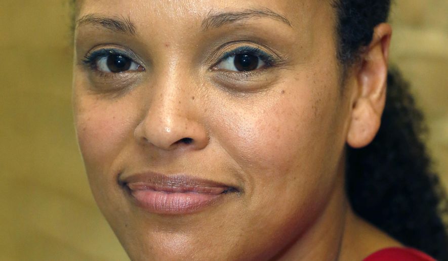 FILE - In this Thursday, Sept. 18, 2014, file photo, Jesmyn Ward, poses for a photo at Millsaps College in Jackson, Miss. Ward’s “Sing, Unburied, Sing” and Mohsin Hamid’s “Exit West” are among the finalists for the fourth annual Kirkus Prize. (AP Photo/Rogelio V. Solis, File)
